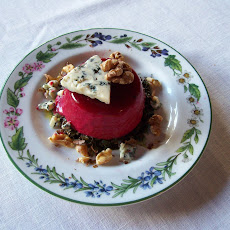 Beet Panna Cotta with Beet Greens in Vinaigrette, Gorgonzola, and Roasted Walnuts