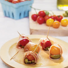 Cherry Tomatoes Wrapped in Prosciutto with Olives