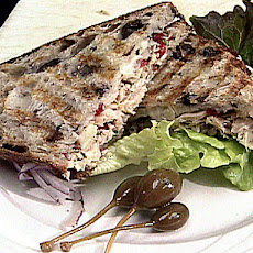 Tuna and Artichoke Salad on Kalamata Olive Bread with Provolone Cheese and Fresh Herb and Garlic Aioli