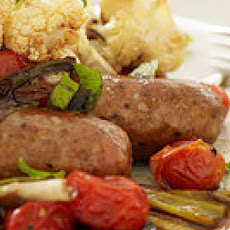 Roasted Sausages with Balsamic Burst Tomatoes and Parmigiano-Reggiano Cauliflower