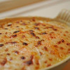Individual Sweet Potato Gratins with Creme Fraiche, Onions, and Bacon