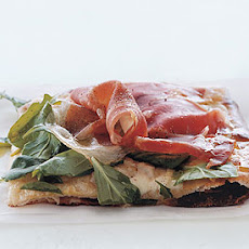Pizza with Fontina, Prosciutto, and Arugula