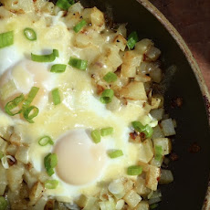 Soft-Cooked Eggs on Cheesy Skillet Hash