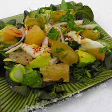 Ceviche with pink grapefruit and green olives