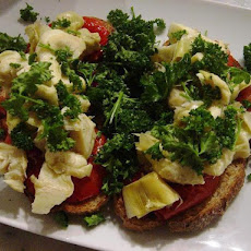 Bruschetta with Tomatoes, Artichoke Hearts and Parsley