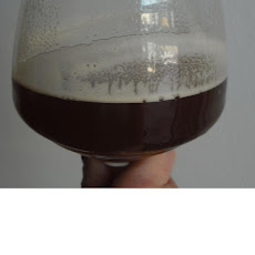 Beer Cocktail with Pomegranate Molasses and Elderflower Liqueur