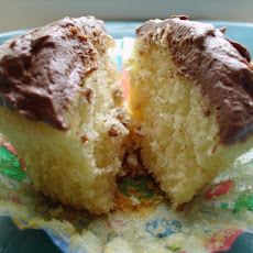 Yellow Cupcakes With Chocolate Frosting