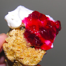 Whole grain scones with green cardamom and lingonberry