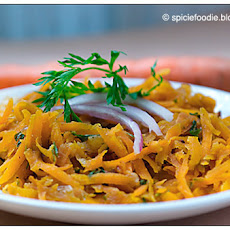 Warm Shredded Carrot Salad with Carrot Greens