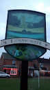 Lolworth Village Sign