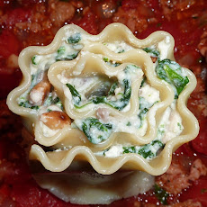 Lovely Lasagna Rolls Filled with Spinach and Goat and Ricotta Cheese Bechamel