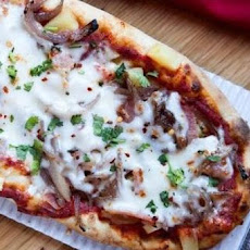 Fontina, Prosciutto and Caramelized Onion Pizza