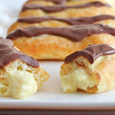 Homemade Chocolate Éclairs stuffed with Vanilla Custard