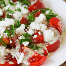Summer Tomato Salad with Goat Cheese, Basil Vinaigrette, and Fresh Herbs