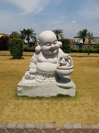 Maitreya With Dog Statue