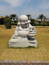 Maitreya With Dog Statue