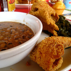 Crispy Catfish and Black Eyed Peas, Bacon and Caramelized Onion Relish with Fried Collard Greens
