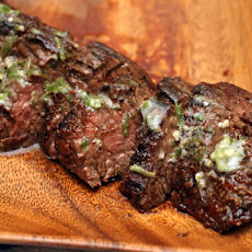 Grilled Chipotle-Rubbed Steaks with Lime Butter