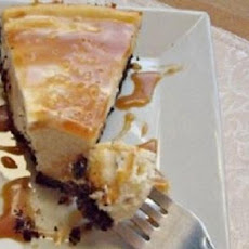 White Chocolate Cheesecake with White Chocolate Brandy Sauce
