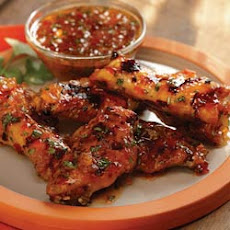 Grilled Chicken Wings with Sweet Red Chili and Peach Glaze