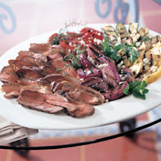 Grilled Butterflied Leg of Lamb and Vegetables with Lemon-Herb Dressing