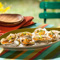 Fire Roasted Low-County Oysters with Tarragon and Red Hot Sauce Butter