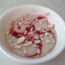 Oatmeal With Almonds and Strawberry Star Anise Sauce