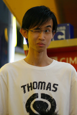 Thomas making a funny face.. either that or something got in his eye..hmm