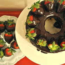 Angel Food Cake covered w/ Chocolate Ganache & w/ Chocolate Covered Strawberries