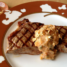 Persimmon Caper Butter Dressing a Steak