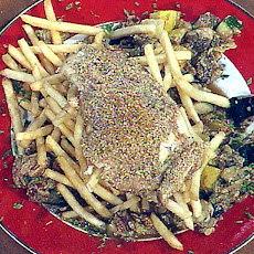 Pecan Crusted Trigger Fish with a Roasted Pecan Vegetable Relish, Meuniere Sauce and a Pile of Shoestring Potatoes