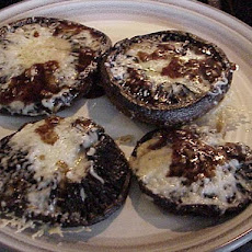 Pan Roast Portabella Mushrooms With Dijon Vinaigrette & Asiago Cheese