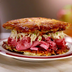 Latke Corned Beef Sandwich with Apple and Sour Cream Slaw