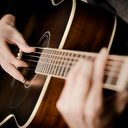 Guitar Lessons Free mobile app icon