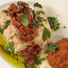 Steamed Wild Striped Bass with Yellow Pepper Romesco, Red Pepper-Black Olive Relish and Parsley-Garlic Oil