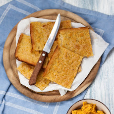 Chickpea cake with carrot hummus