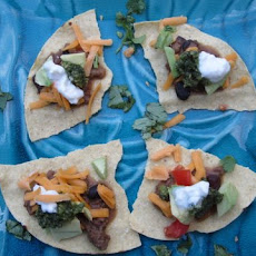 Chile Colorado Tostadas with Pumpkin Seed and Cilantro 