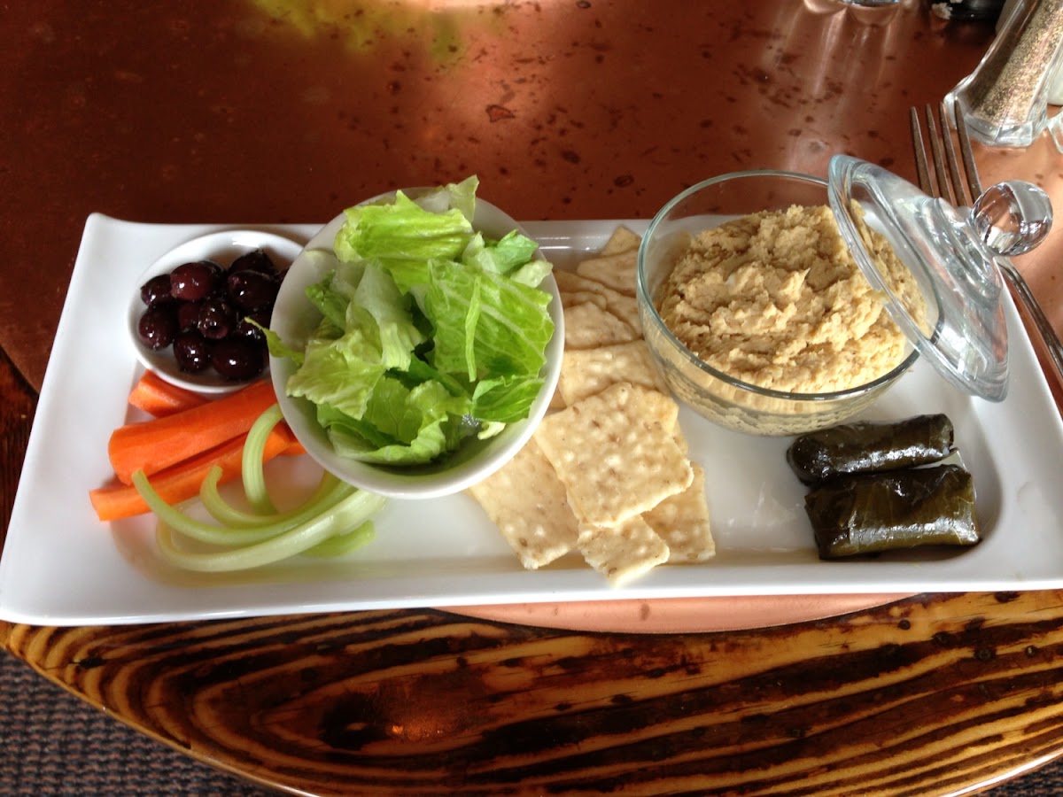 Very tasty Mediterranean Hummus, Rice Crackers, Veggies with Dolomites and Greek Olives. One of the 