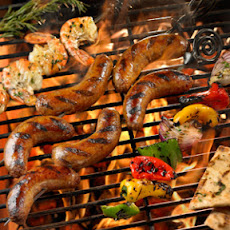 Grilled Sausage with Marinated Shrimp, Peppers and Onions