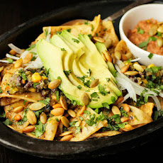 Vegan: Chilaquiles with Pepitas, Charred Corn, and Black Beans