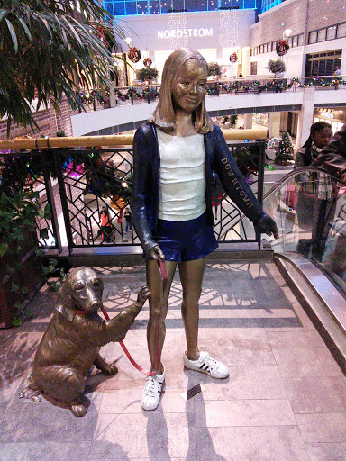 Girl and Dog Statue
