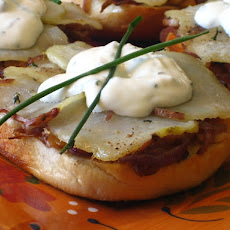 Bagel 'Pizzas' with Caramelized onions, Roasted Potatoes & Herbs topped with a faux Goat Cheese Creme Fraîche