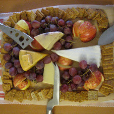 Warmed Brie With Orange Sauce