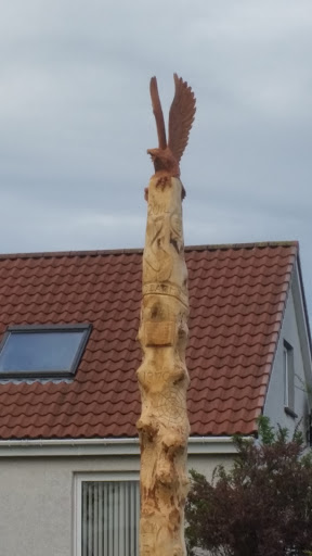 Carved Falcon on a Totem
