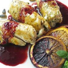 Chicken, feta, and mint roulade with a blood orange reduction