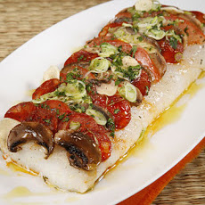 Pizza of Roasted Cod Spiked with Chorizo, Tomatoes, and Mushrooms