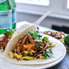 Crockpot BBQ Beer Pulled Pork Tacos with Crispy Onion Straws and Mango Salsa