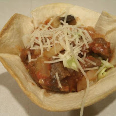 Stir Fried Beef Salad in Tortilla Cups