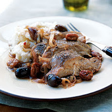 Turkey Thighs with Olives, Dried Cherries, and Chiles