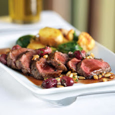 Grilled Lamb with Curried Vegetables and Grape Pine Nut Gremolata